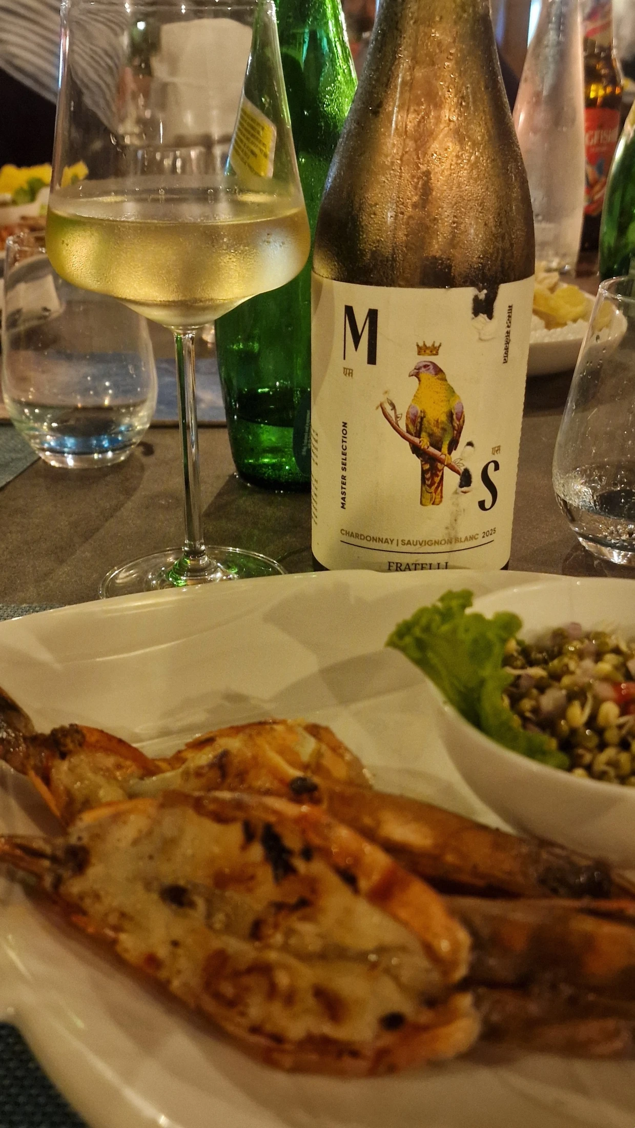 Fratelli Master Selection Chardonnay - Sauvignon Blanc 2025 with grilled tiger prawns at Bay View